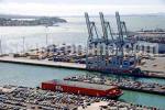 ID 6172 The Port of Auckland's general wharves. Captain Cook wharf in foreground is used mainly for the discharge of motor vehicles. Behind is Marsden Wharf and the Bledisloe Container Terminal (centre)....